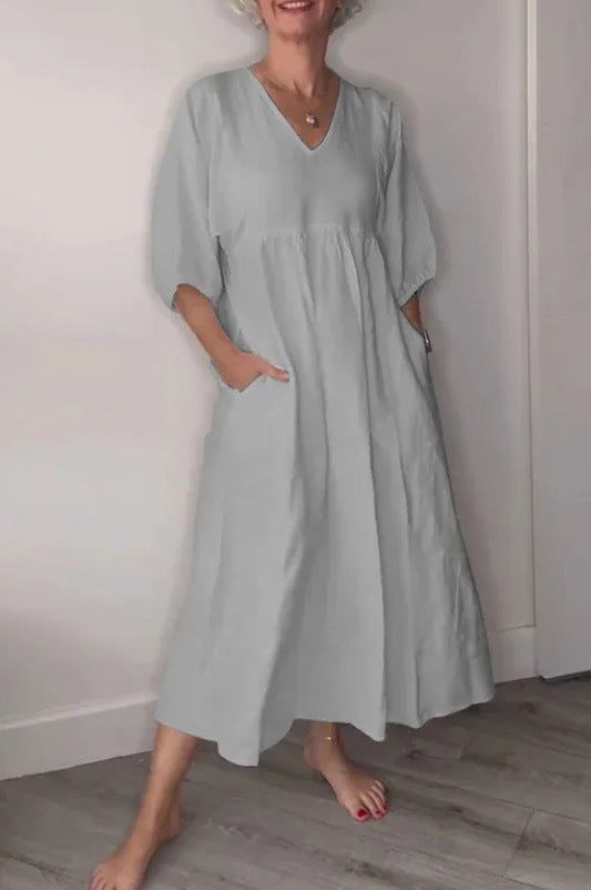 Deep V-neck pleated solid color pocket dress