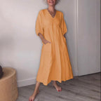 Deep V-neck pleated solid color pocket dress